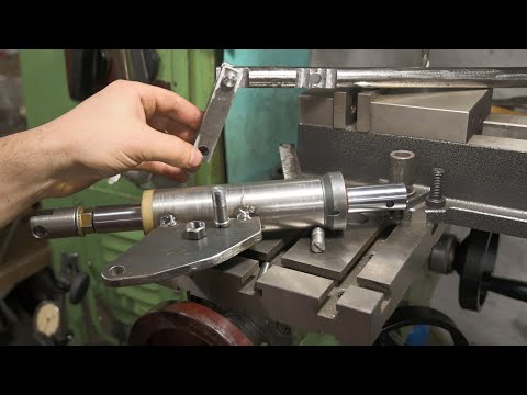 Homemade slotting device from the shock absorber rod for the TV-7M lathe