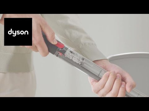 How to empty the clear bin on the Dyson PencilVac Fluffycones™