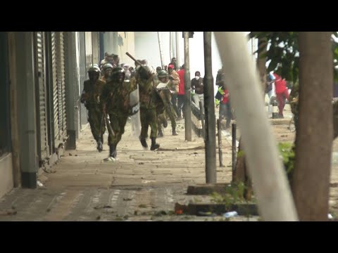 Kenyan protesters charge police as demonstrations turn violent | AFP