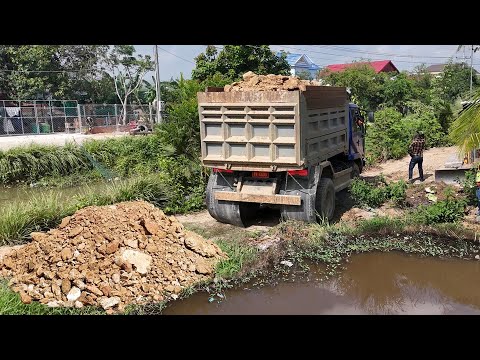 Excellent process !! Flooded areas are filled with soil by NISSAN truck & KOMATSU dozer