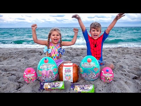 Diana và Roma chơi với bố trên bãi biển