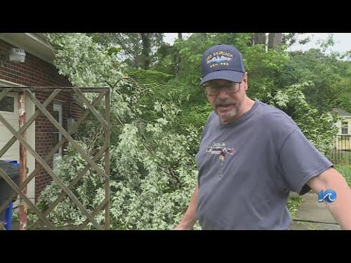 Tree damages home in Portsmouth as storm rolls in