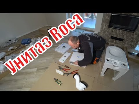 Installation and assembly of a Roca floor-standing toilet.