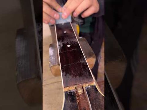 Repair of the neck of an old Japanese guitar