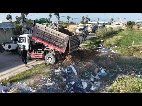 GREAT Job! Excellent KOMATSU Bulldozer Push Stone Building New Road With Dump Trucks Processing