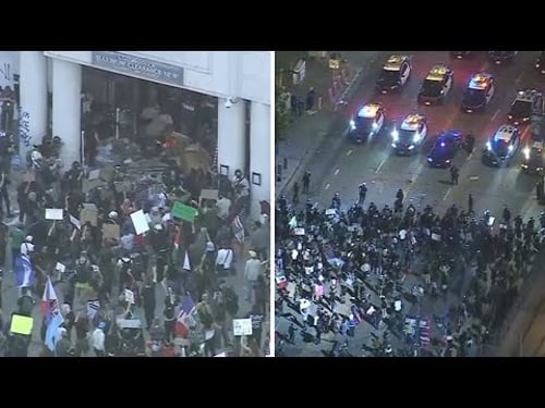 Protesters clash with officers after 'ICE Out' protest in downtown LA