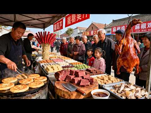 最具中国特色的河南乡村大集市!麻酱烩面人气爆满!大锅凉粉烟火十足,网红1米超长糖葫芦,1元3个水煎包便宜实惠,松软的鸡蛋糕现做现卖,传统小吃吹糖人,每一样都让人馋到流口水,冬日里美食盛宴!