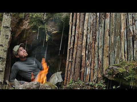 Building a Primitive Shelter Under a Hill - Can it Keep me Dry? Bushcraft, ASMR 🌦️🌲
