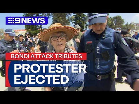 'Get her out!' Protester removed from Bondi vigil | 9 News Australia